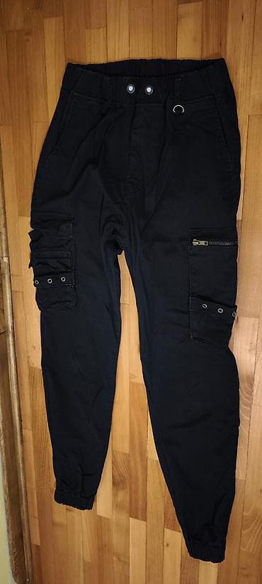 Pantalone conto bene sa džepovima sa strane, crne, veličina 28/29 na lalafo.rs — 4 Pantalone conto bene sa džepovima sa strane, crne, veličina 28/29 — 4