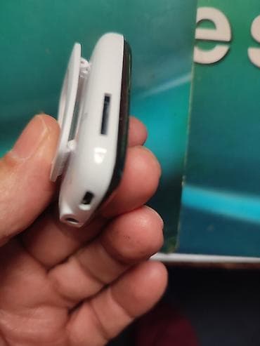 Intenso MP3 plejer sa ekranom i štipaljkom, sa slotom za micro sd na lalafo.rs — 3 Intenso MP3 plejer sa ekranom i štipaljkom, sa slotom za micro sd — 3