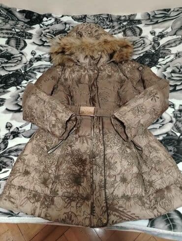 Ženska zimska jakna sa kapuljačom i krznenim obrubom. - Boja: topla na lalafo.rs Ženska zimska jakna sa kapuljačom i krznenim obrubom. - Boja: topla