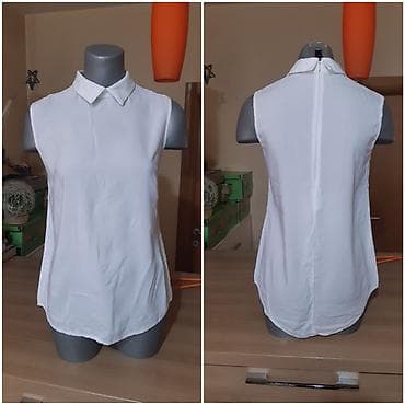 Brandy Melville bela bezrukavna košulja - Model: bez rukava, klasična na lalafo.rs — 2 Brandy Melville bela bezrukavna košulja - Model: bez rukava, klasična — 2