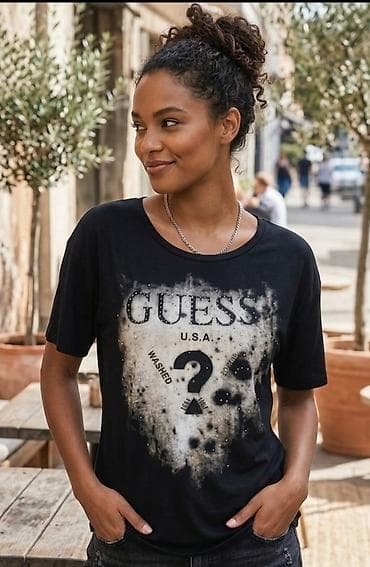Ženska majica Guess U.S.A. - Boja: crna sa “washed” efektom na na lalafo.rs Ženska majica Guess U.S.A. - Boja: crna sa “washed” efektom na
