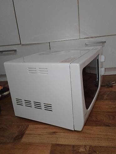 Samsung mikrotalasna rerna sa grill funkcijom - Model sa mehaničkim na lalafo.rs — 7 Samsung mikrotalasna rerna sa grill funkcijom - Model sa mehaničkim — 7