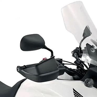 Štitnik za ruke za motocikl sa integrisanim retrovizorom. Ovaj dodatak na lalafo.rs Štitnik za ruke za motocikl sa integrisanim retrovizorom. Ovaj dodatak
