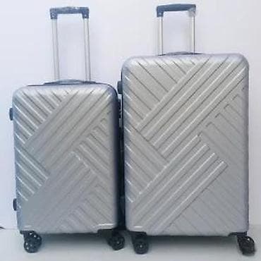 dve suknje po: Tvrdi kofer za putovanje – srebrni - Materijal: izdržljiva at lalafo.rs — 6 dve suknje po: Tvrdi kofer za putovanje – srebrni - Materijal: izdržljiva — 6