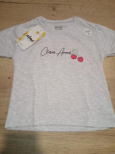 dve suknje po: Dečija majica kratkih rukava – siva melange boja. Brend: alme (etiketa at lalafo.rs — 2 dve suknje po: Dečija majica kratkih rukava – siva melange boja. Brend: alme (etiketa — 2