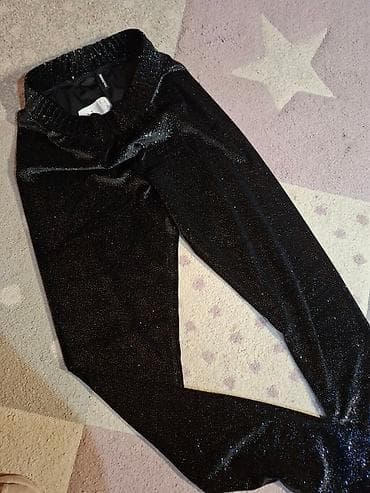 Crne šljokičaste helanke - Brend: Calzedonia (etiketa vidljiva na at lalafo.rs — 3 Crne šljokičaste helanke - Brend: Calzedonia (etiketa vidljiva na — 3