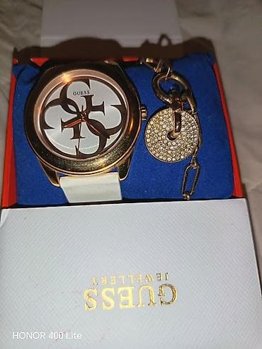 GUESS ženski set – sat i narukvica original - Modni sat sa velikim at lalafo.rs — 3 GUESS ženski set – sat i narukvica original - Modni sat sa velikim — 3