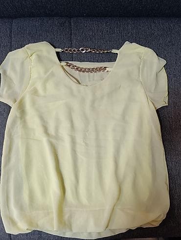 Ženska bluzica u svetložutoj boji, laganog i lepršavog kroja. - na lalafo.rs — 4 Ženska bluzica u svetložutoj boji, laganog i lepršavog kroja. - — 4