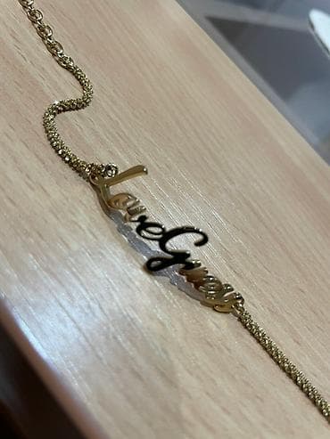 Zlatna narukvica od nerđajućeg čelika sa natpisom “LoveGuess” u skript na lalafo.rs — 1 Zlatna narukvica od nerđajućeg čelika sa natpisom “LoveGuess” u skript — 1