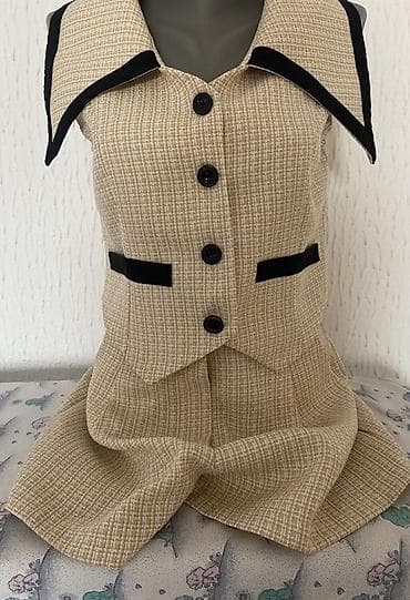 Elegantni ΕΎenski komplet β prsluk i suknja - Tkanina: strukirana na lalafo.rs Elegantni ΕΎenski komplet β prsluk i suknja - Tkanina: strukirana