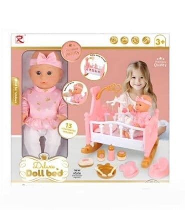 Lutka beba sa kolevkom De luxe kolekcija bebe lutke. Beba pije i mokri na lalafo.rs Lutka beba sa kolevkom De luxe kolekcija bebe lutke. Beba pije i mokri