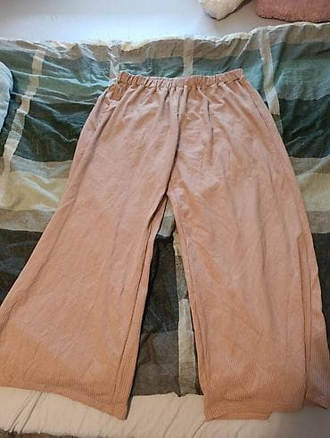 Ružičaste wide-leg pantalone od mekanog rebrastog (riblja na lalafo.rs Ružičaste wide-leg pantalone od mekanog rebrastog (riblja