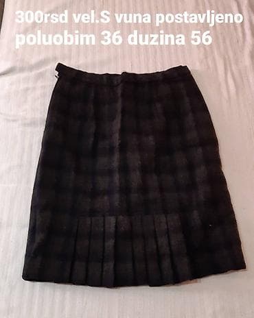Vunena suknja, kockasti dezen u tamnim tonovima, postavljena. Model sa na lalafo.rs Vunena suknja, kockasti dezen u tamnim tonovima, postavljena. Model sa