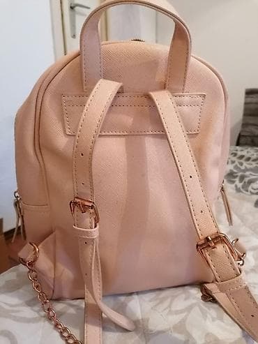 Ranac puder roze, bez oštećenja, srednje veličine na lalafo.rs — 4 Ranac puder roze, bez oštećenja, srednje veličine — 4