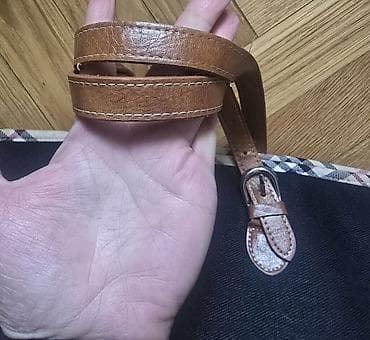 Crna prostrana torba da braon ruckama i burberry šarom na obodu torbe na lalafo.rs — 5 Crna prostrana torba da braon ruckama i burberry šarom na obodu torbe — 5