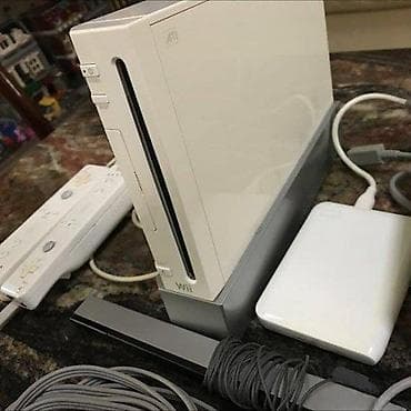 🎮 Nintendo Wii set (odlično stanje) 📦 Original oprema: konzola + AV + na lalafo.rs — 1 🎮 Nintendo Wii set (odlično stanje) 📦 Original oprema: konzola + AV + — 1
