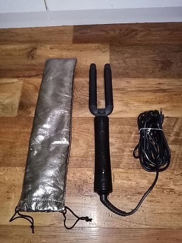 Stajler za kosu REMINGTON je u odlicnom stanju i koristen svega 2 - 3 na lalafo.rs Stajler za kosu REMINGTON je u odlicnom stanju i koristen svega 2 - 3