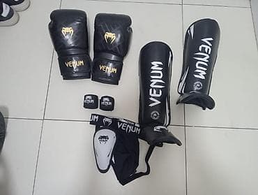 Sports & Leisure: Venum boxing kit includes 14 oz black boxing gloves with gold and at lalafo.rs — 1 Sports & Leisure: Venum boxing kit includes 14 oz black boxing gloves with gold and — 1