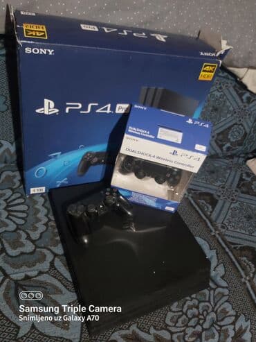 Sony PlayStation 4 Pro konzola + DualShock 4 - Model: PS4 Pro (CUH na lalafo.rs Sony PlayStation 4 Pro konzola + DualShock 4 - Model: PS4 Pro (CUH