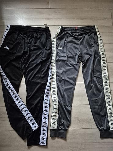 Kappa muške trenerke – model sa bočnim trakama sa logotipom - Brend na lalafo.rs Kappa muške trenerke – model sa bočnim trakama sa logotipom - Brend