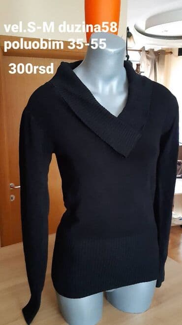 Crni ženski džemper sa dugim rukavima i V-izrezom sa širokom rebrastom na lalafo.rs Crni ženski džemper sa dugim rukavima i V-izrezom sa širokom rebrastom