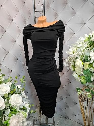 Elegantna crna haljina – midi dužina sa naborima - Model: pripijena na lalafo.rs — 1 Elegantna crna haljina – midi dužina sa naborima - Model: pripijena — 1