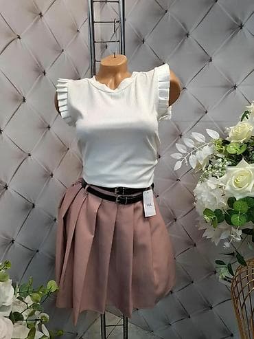 Ženska kombinacija – top i suknja - Gornji deo: beli top bez rukava sa na lalafo.rs Ženska kombinacija – top i suknja - Gornji deo: beli top bez rukava sa