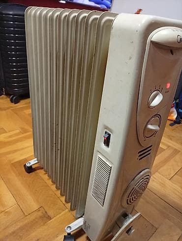 Uljani radijatori: Uljeni radijator Midea sa 12 rebara i ispravnim ventilatorom - Tip na lalafo.rs — 9 Uljani radijatori: Uljeni radijator Midea sa 12 rebara i ispravnim ventilatorom - Tip — 9