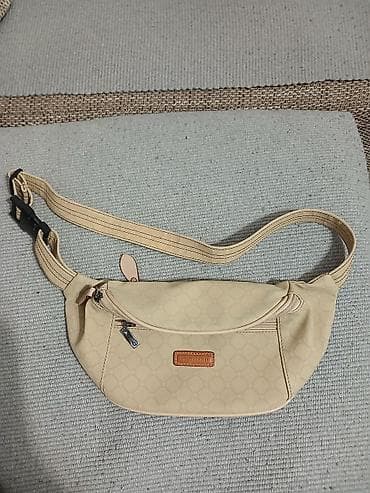 Bež torbica/ranac za nošenje preko tela (waist/hip bag) Sergio na lalafo.rs Bež torbica/ranac za nošenje preko tela (waist/hip bag) Sergio