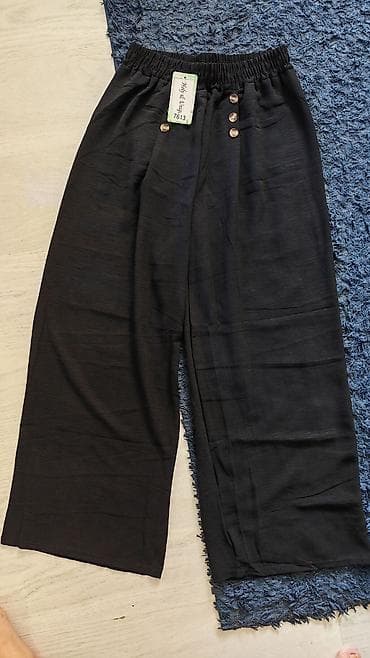 Ženske široke pantalone sa elastičnim pojasom - Model: 7613 (etiketa na lalafo.rs Ženske široke pantalone sa elastičnim pojasom - Model: 7613 (etiketa