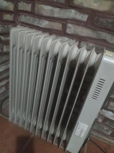 Uljani radijatori: Uljani radijator sa 11 rebara - Tip: električni uljani radijator - na lalafo.rs — 1 Uljani radijatori: Uljani radijator sa 11 rebara - Tip: električni uljani radijator - — 1