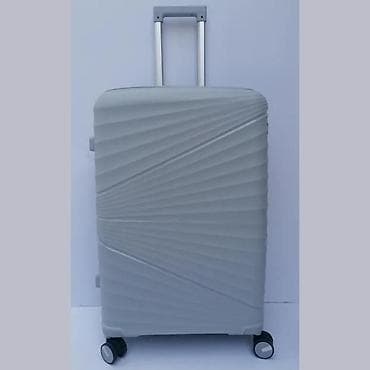 Travel suitcases and bags: Tvrdi kofer na točkićima – sivi - Materijal: lagana i izdržljiva at lalafo.rs — 1 Travel suitcases and bags: Tvrdi kofer na točkićima – sivi - Materijal: lagana i izdržljiva — 1