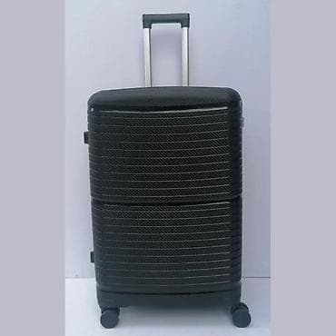 Travel suitcases and bags: Tvrdi kofer na točkićima – crni, sa teksturom karbona - Materijal at lalafo.rs — 1 Travel suitcases and bags: Tvrdi kofer na točkićima – crni, sa teksturom karbona - Materijal — 1