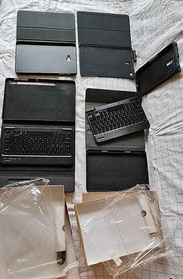 Set futrola sa Bluetooth tastaturama za tablet - Više kompleta na lalafo.rs — 4 Set futrola sa Bluetooth tastaturama za tablet - Više kompleta — 4