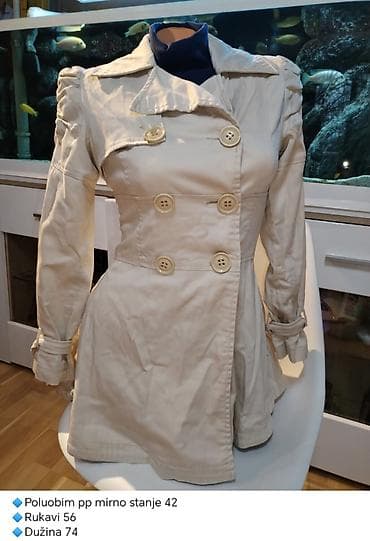 Ženski bež mantil/kabanica sa duplim kopčanjem na dugmad i širokim at lalafo.rs — 1 Ženski bež mantil/kabanica sa duplim kopčanjem na dugmad i širokim — 1