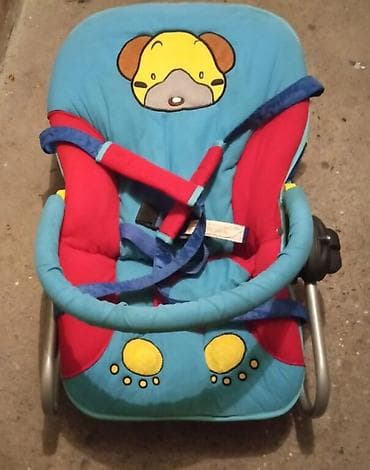 Auto-sedište/nosiljka za bebe sa šarenim navlakama i motivom psa. - at lalafo.rs — 1 Auto-sedište/nosiljka za bebe sa šarenim navlakama i motivom psa. - — 1