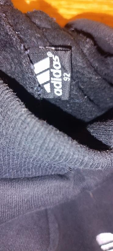 Crne dečije pantalone "Adidas" sa plavim bočnim trakama i belim na lalafo.rs — 2 Crne dečije pantalone "Adidas" sa plavim bočnim trakama i belim — 2