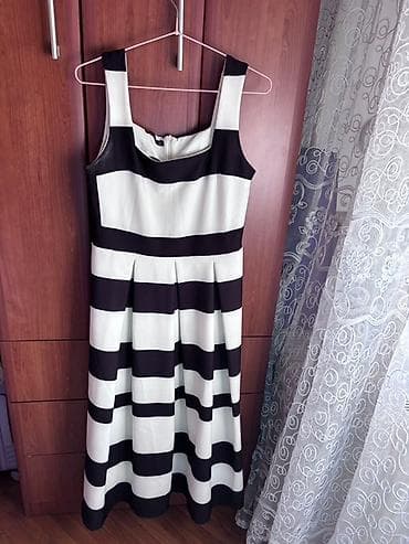 Ženska haljina A-kroja, bez rukava, sa širokim bretelama i dekolteom u na lalafo.rs Ženska haljina A-kroja, bez rukava, sa širokim bretelama i dekolteom u