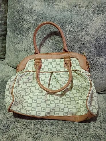 Ženska torba – bež/boja kože - Materijal: platno sa monogram printom at lalafo.rs — 1 Ženska torba – bež/boja kože - Materijal: platno sa monogram printom — 1