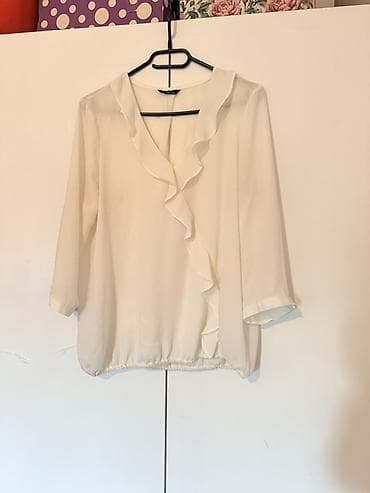 Zenske bluze – elegantne i udobne, idealne za posao i svečane prilike na lalafo.rs — 7 Zenske bluze – elegantne i udobne, idealne za posao i svečane prilike — 7