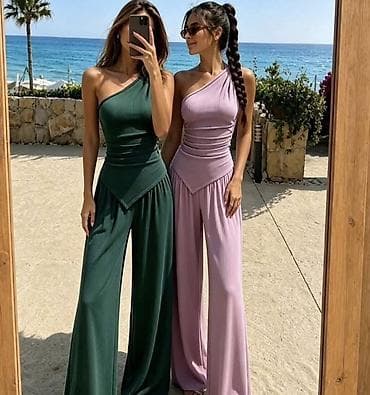 Komplet majica u pero na jedno rame nacigovana i siroke pantalone sa na lalafo.rs Komplet majica u pero na jedno rame nacigovana i siroke pantalone sa