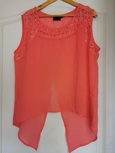 Ženski bezrukavni top/tunika u boji korala (etiketa: Rainbow). - na lalafo.rs — 2 Ženski bezrukavni top/tunika u boji korala (etiketa: Rainbow). - — 2