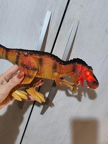 Interaktivna igračka dinosaur – T‑Rex sa svetlećim efektima - at lalafo.rs — 1 Interaktivna igračka dinosaur – T‑Rex sa svetlećim efektima - — 1