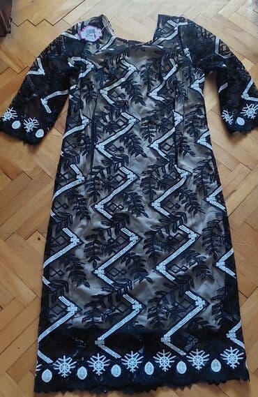 Elegantna haljina sa čipkom i vezom - Model: midi dužina, ravna na lalafo.rs Elegantna haljina sa čipkom i vezom - Model: midi dužina, ravna