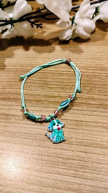 Narukvica sa priveskom – psić - Ručno pletena mint/tirkiz kanap at lalafo.rs — 1 Narukvica sa priveskom – psić - Ručno pletena mint/tirkiz kanap — 1