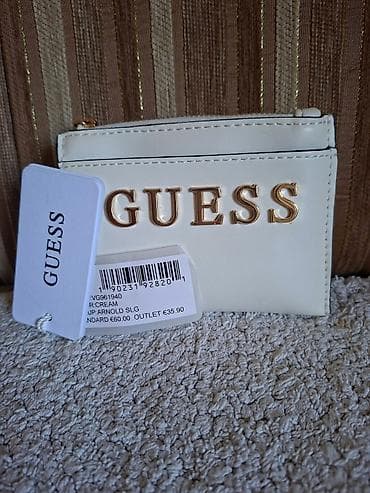 GUESS ženski novčanik/kartičarnik u krem boji. - Materijal: veštačka na lalafo.rs GUESS ženski novčanik/kartičarnik u krem boji. - Materijal: veštačka