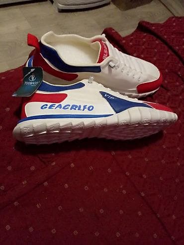 Patike sportskog dizajna u beloj boji sa crvenim i plavim detaljima na lalafo.rs — 2 Patike sportskog dizajna u beloj boji sa crvenim i plavim detaljima — 2