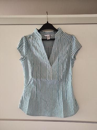 H&M pamucna majica veličina 36. Vise odgovara za XS at lalafo.rs H&M pamucna majica veličina 36. Vise odgovara za XS