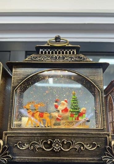 Veliki novogodišnji fenjer sa muzikom i simulacijom snega 22x8x29 na lalafo.rs Veliki novogodišnji fenjer sa muzikom i simulacijom snega 22x8x29