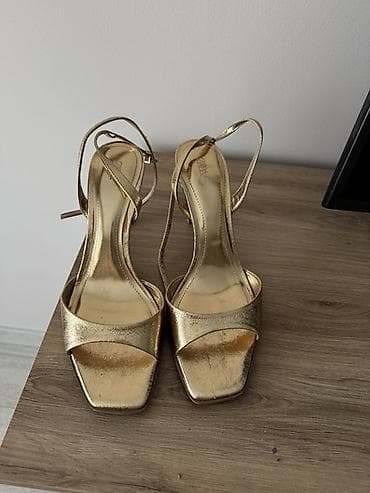 Zlatne sandale na štiklu Zara veličina 42 - Elegantne sandale u na lalafo.rs — 1 Zlatne sandale na štiklu Zara veličina 42 - Elegantne sandale u — 1